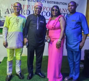The Managing Director, Mr. Okechukwu Okafor (second right), with other management staff at the Performance Recognition Ceremony for outstanding staff of First Power Electricity Company Limited, recently